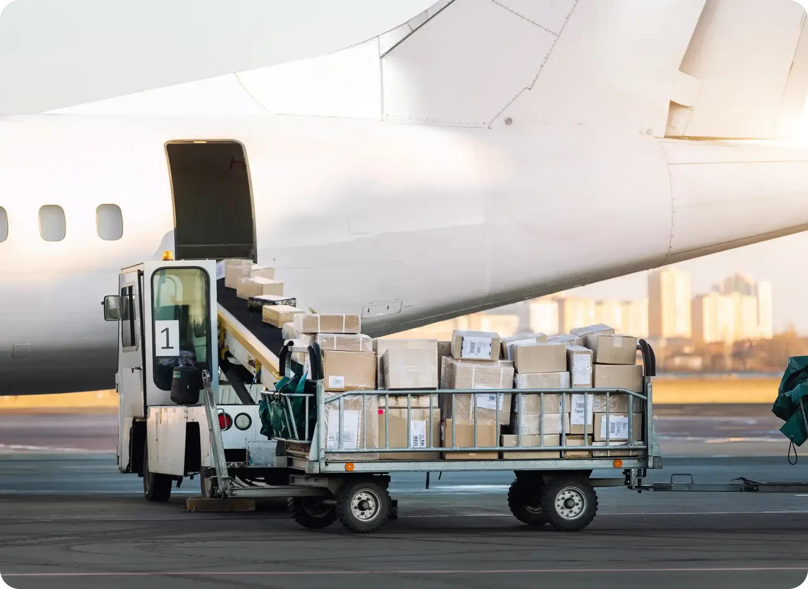 Air cargo plane loading freight at airport terminal for express shipping to us and canada fulfillment centers